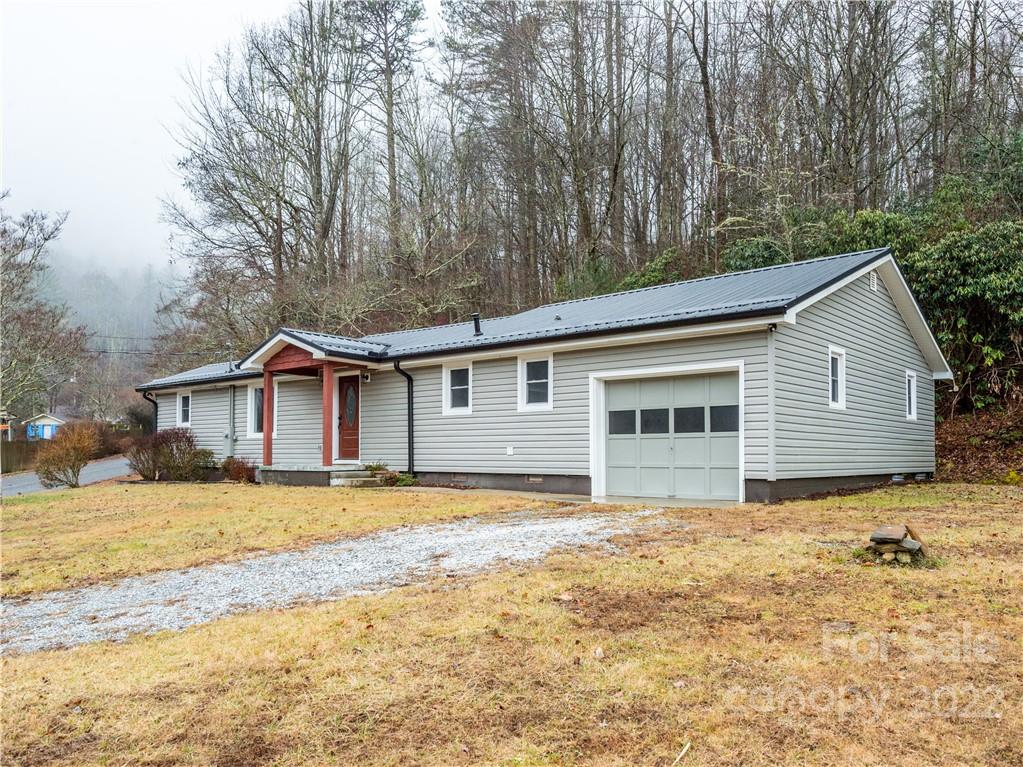16 Jaffe Road Rosman, NC 28772 - Photo 2 of 20 a view of a house with a yard