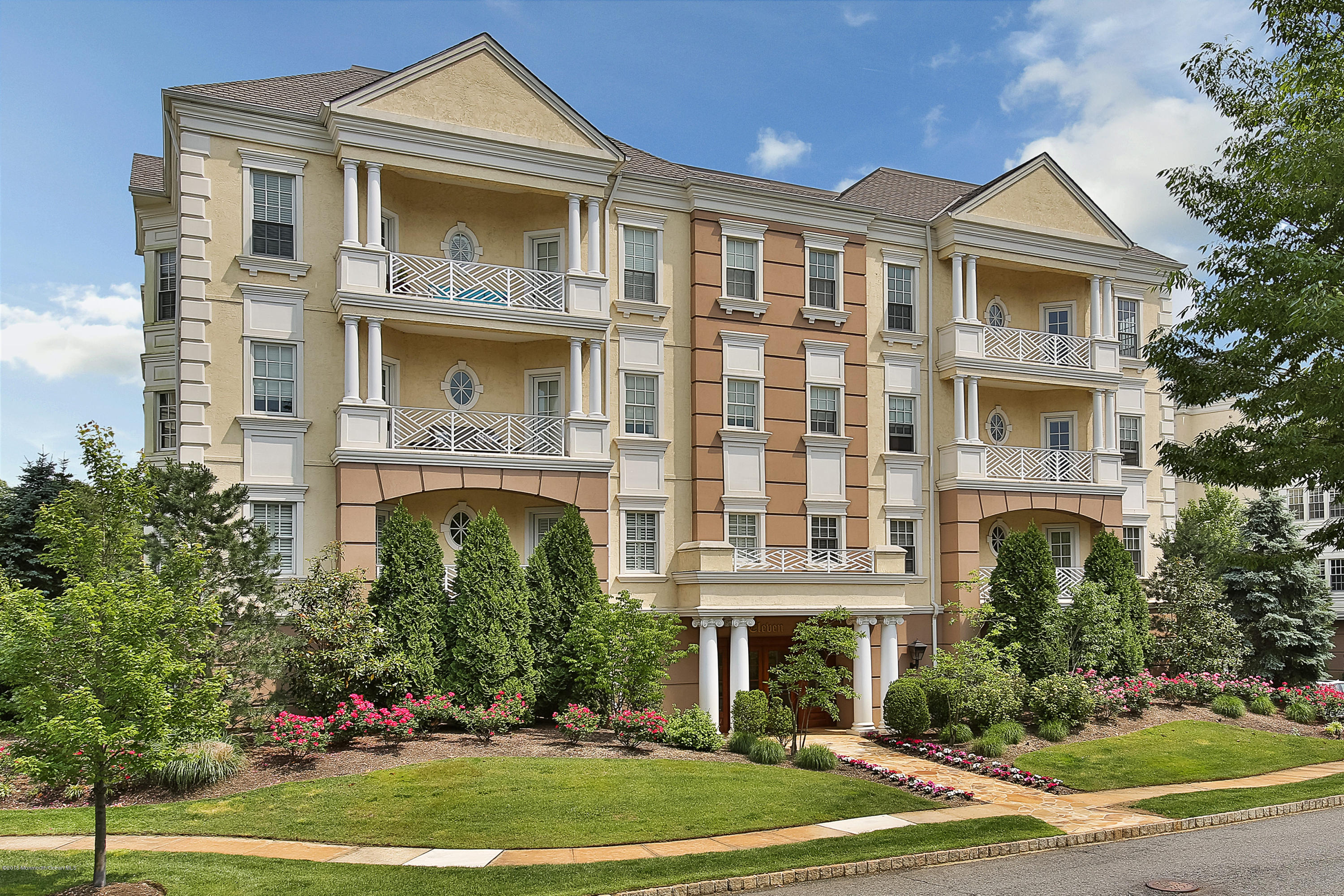 1121 Oval Road Manasquan, NJ 08736 - Photo 1 of 38 Monmouth Bldg 11