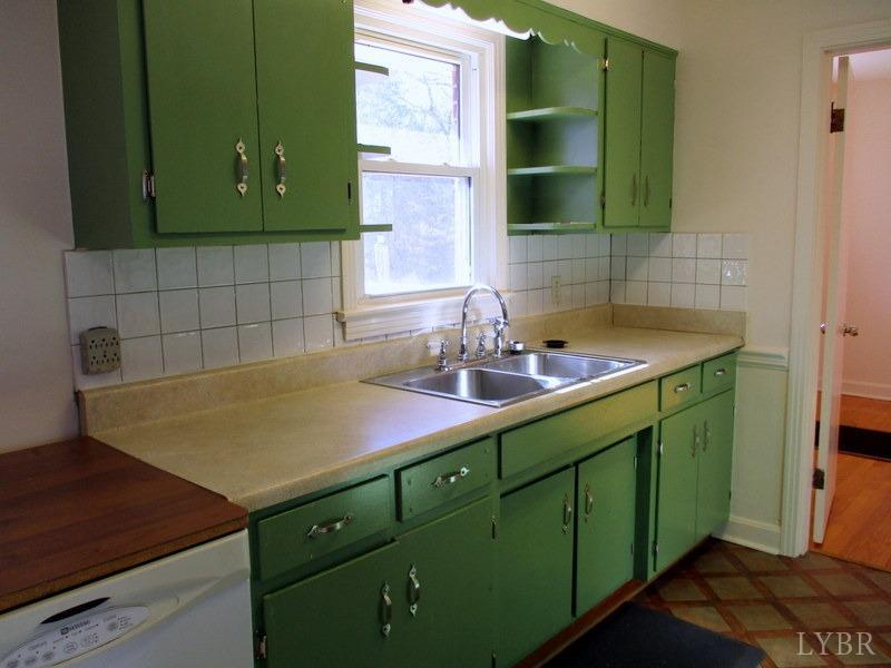 537 Jasper Wood Road Hurt, VA 24563 - Photo 14 of 39 a kitchen with a sink and cabinets