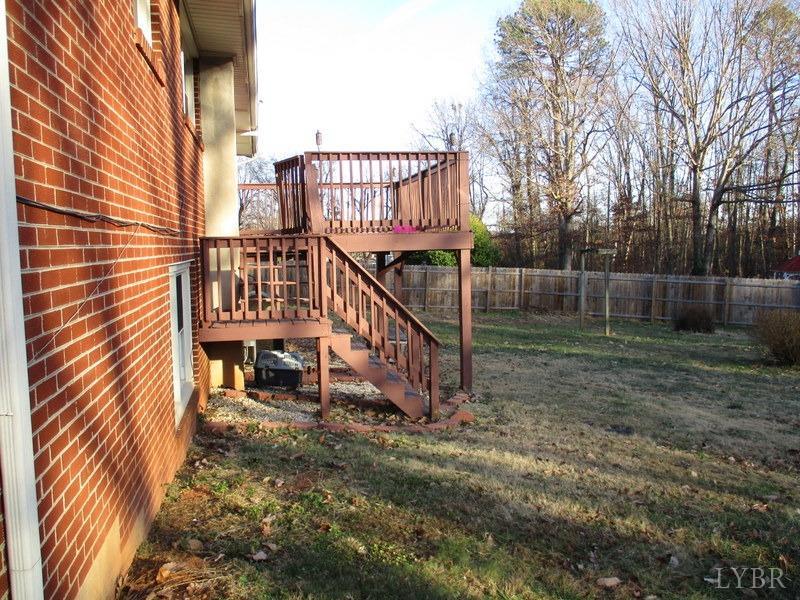 537 Jasper Wood Road Hurt, VA 24563 - Photo 35 of 39 a view of a chair and table in the backyard