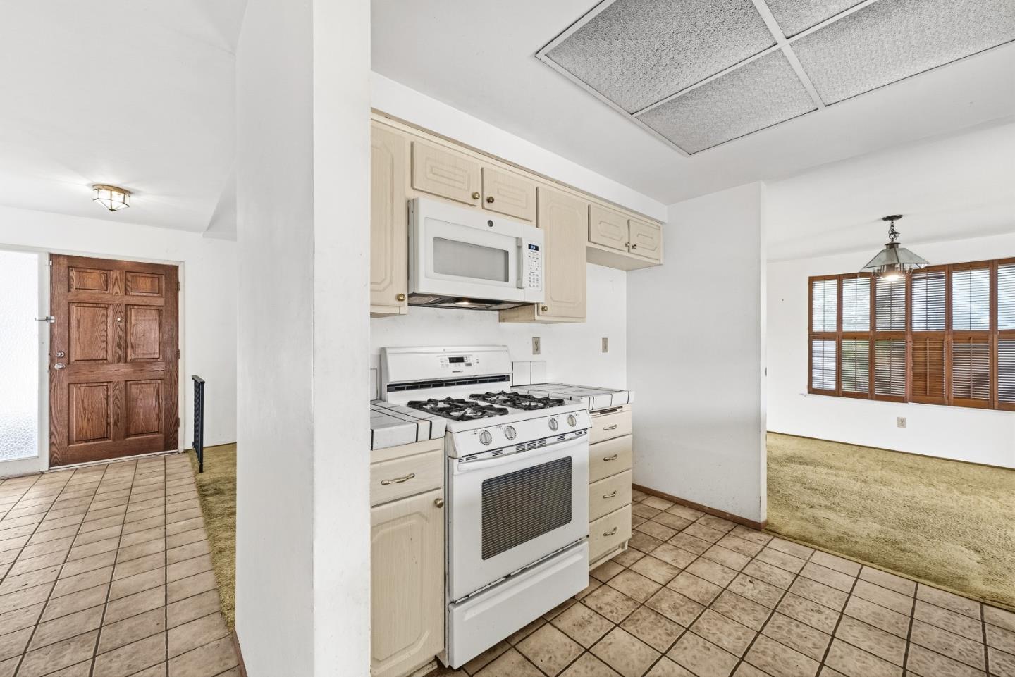 45811 Cheyenne Place Fremont, CA 94539 - Photo 24 of 44 a kitchen with stainless steel appliances granite countertop a stove and a refrigerator