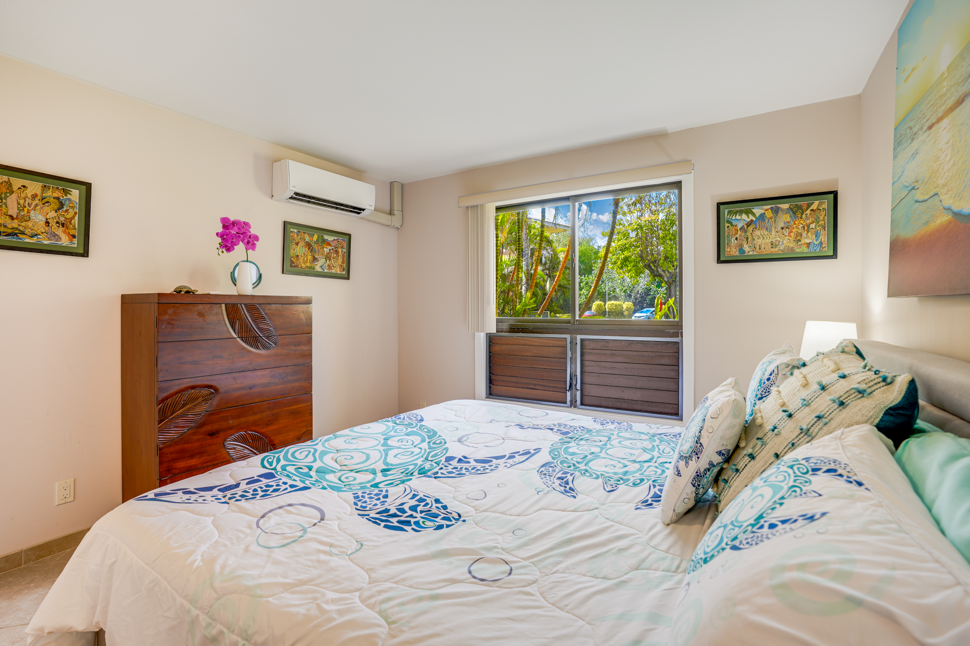 4330 Kauai Beach Drive, Unit E13 Lihue, HI 96766 - Photo 18 of 30 a bedroom with a bed and a dresser
