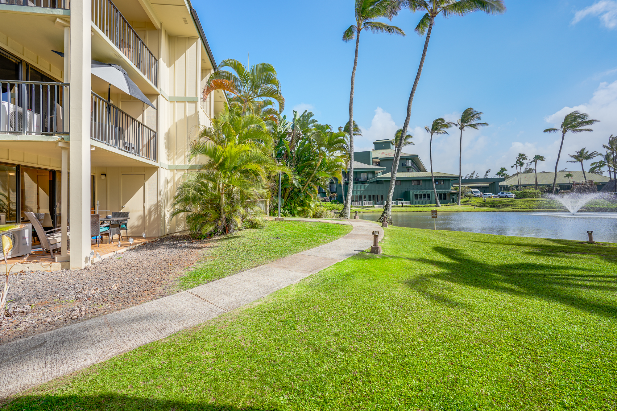 4330 Kauai Beach Drive, Unit E13 Lihue, HI 96766 - Photo 10 of 30 a view of a swimming pool with a lake view