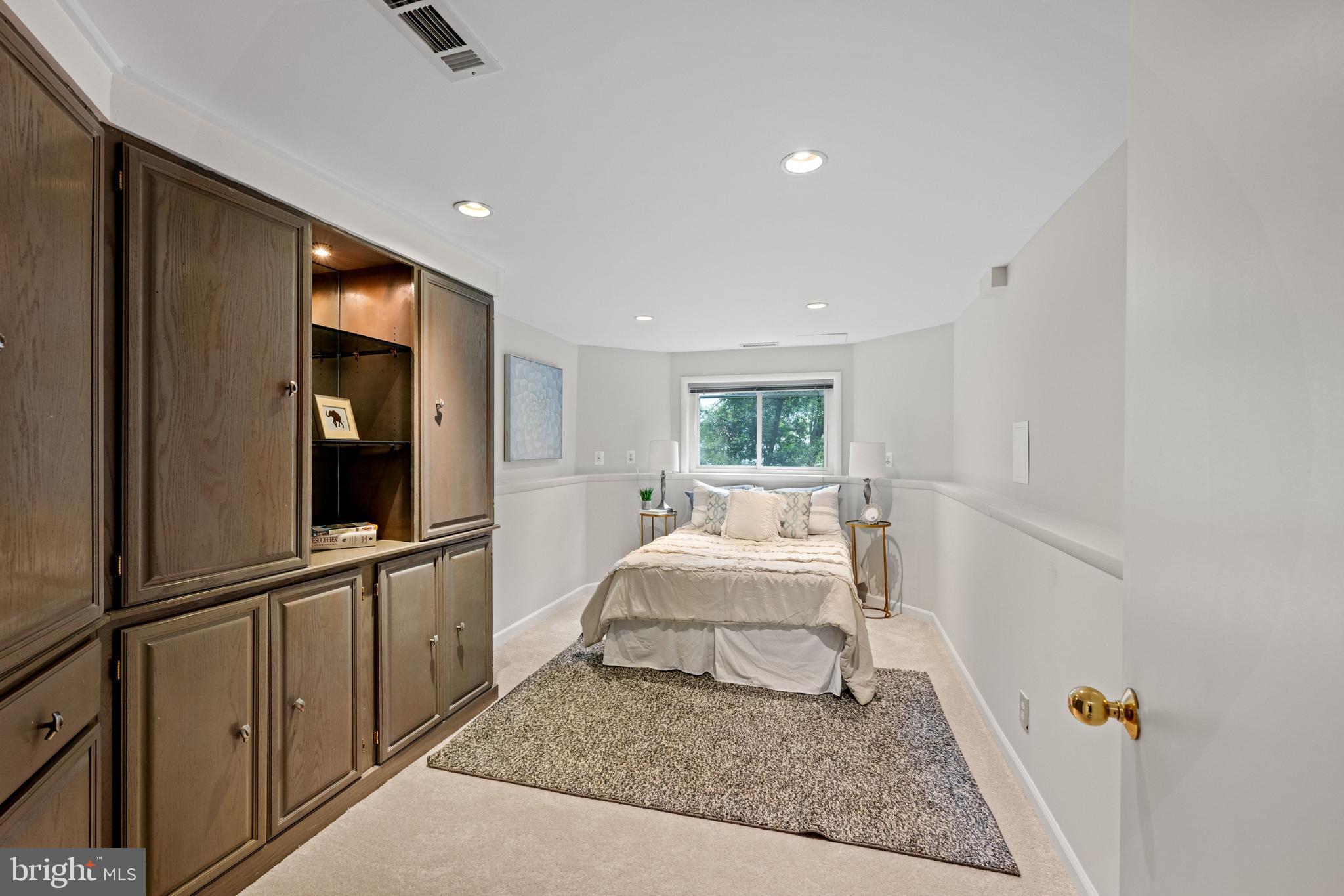 3529 Yuma Street Northwest Washington, DC 20008 - Photo 41 of 46 a bed room with a bed and a window