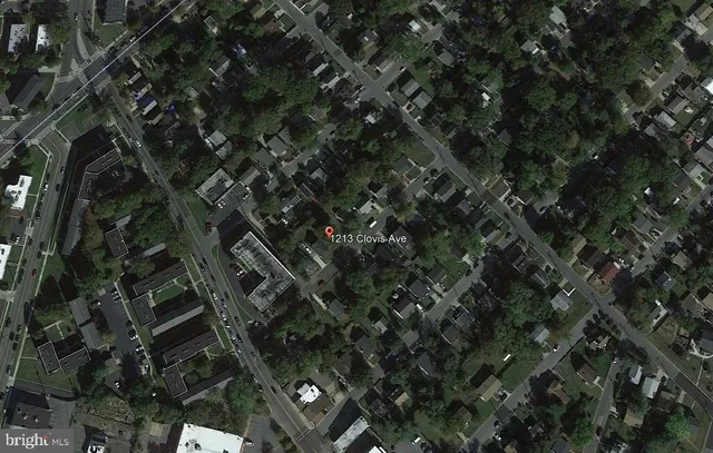 a view of a house with a tree