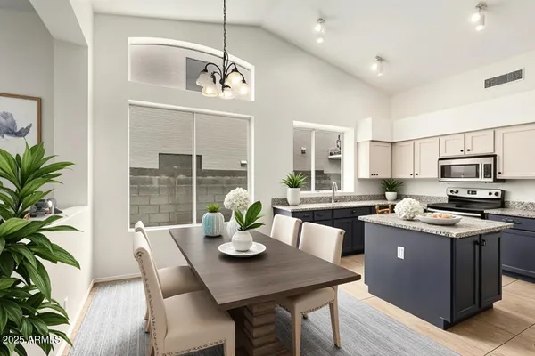 a kitchen with a table chairs stove and microwave