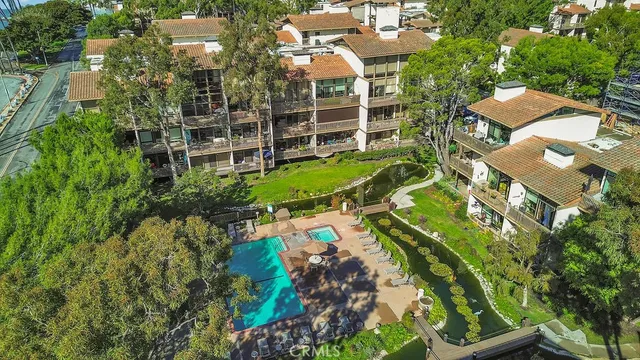 an aerial view of a house with a garden