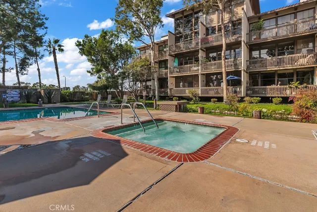 a view of a building with a swimming pool