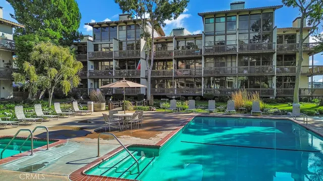 a building view with sitting space and garden view