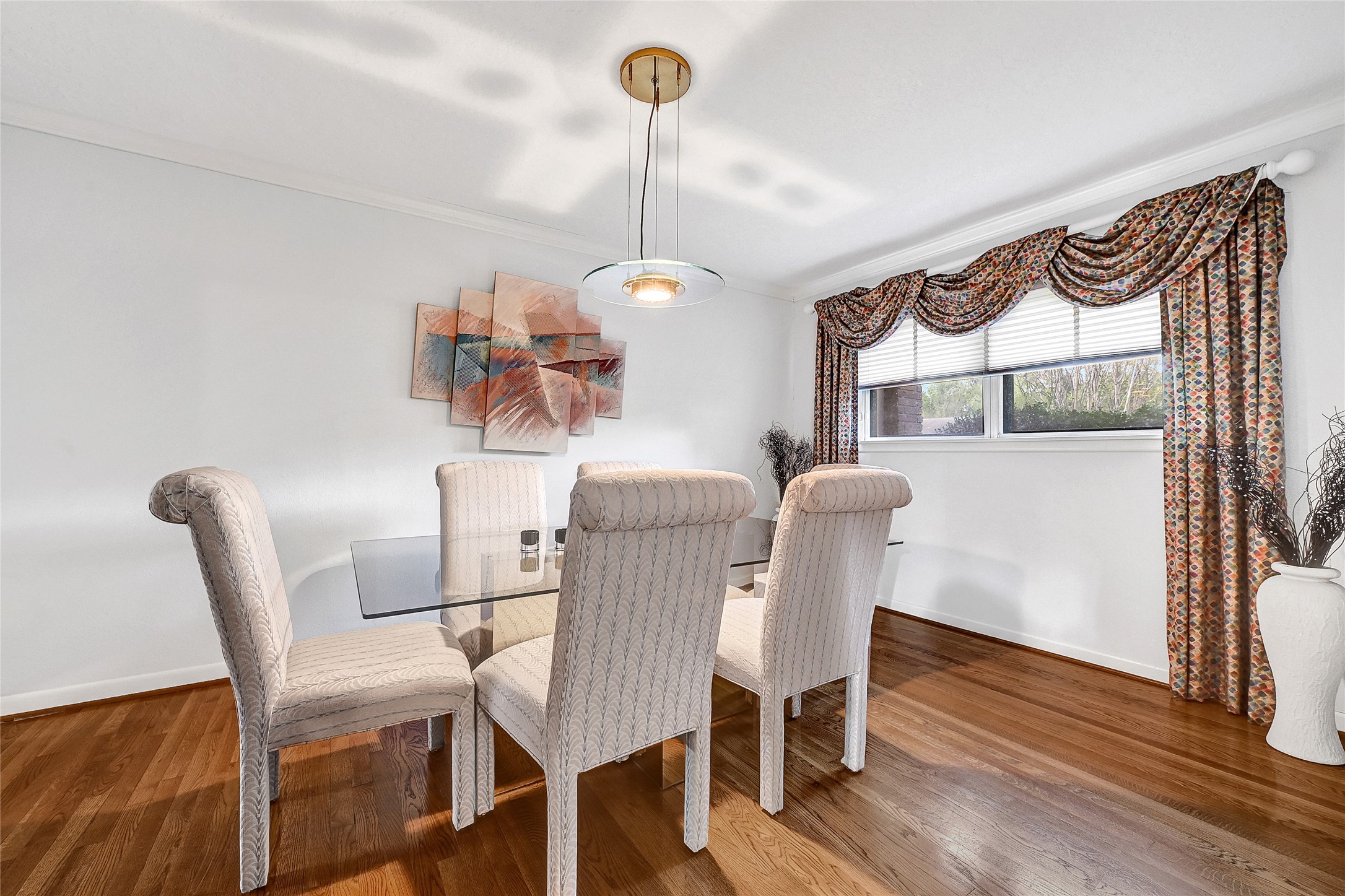 4831 Knickerbocker Street Houston, TX 77035 - Photo 13 of 50 a view of a dining room with furniture window and wooden floor