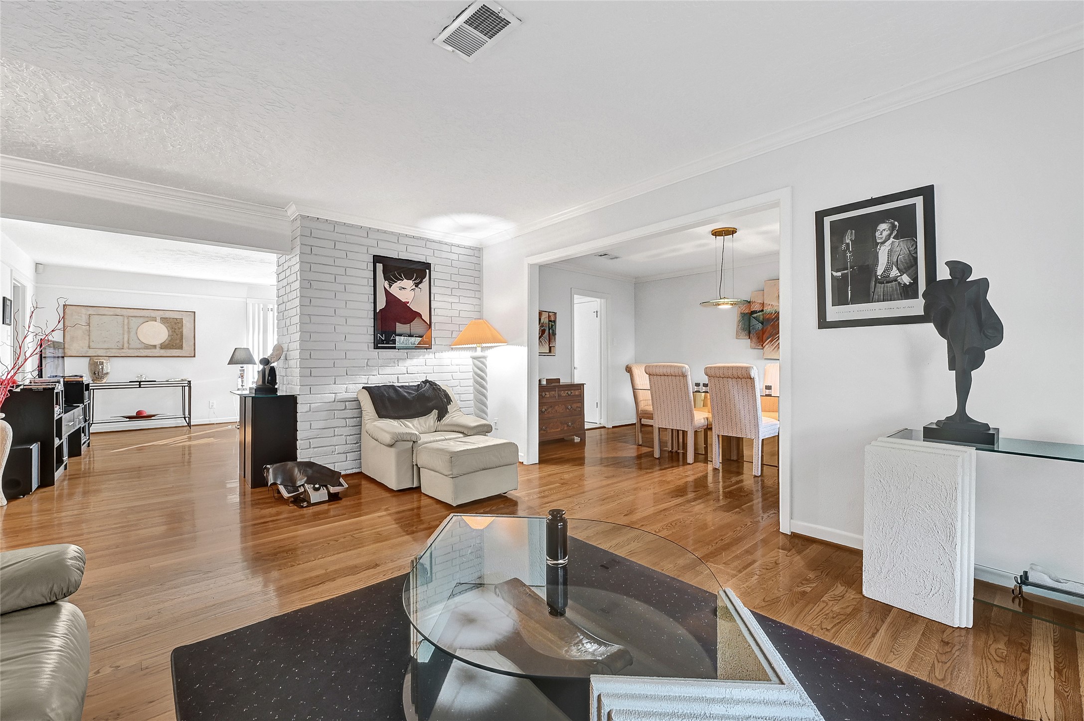 4831 Knickerbocker Street Houston, TX 77035 - Photo 14 of 50 a living room with furniture and wooden floor