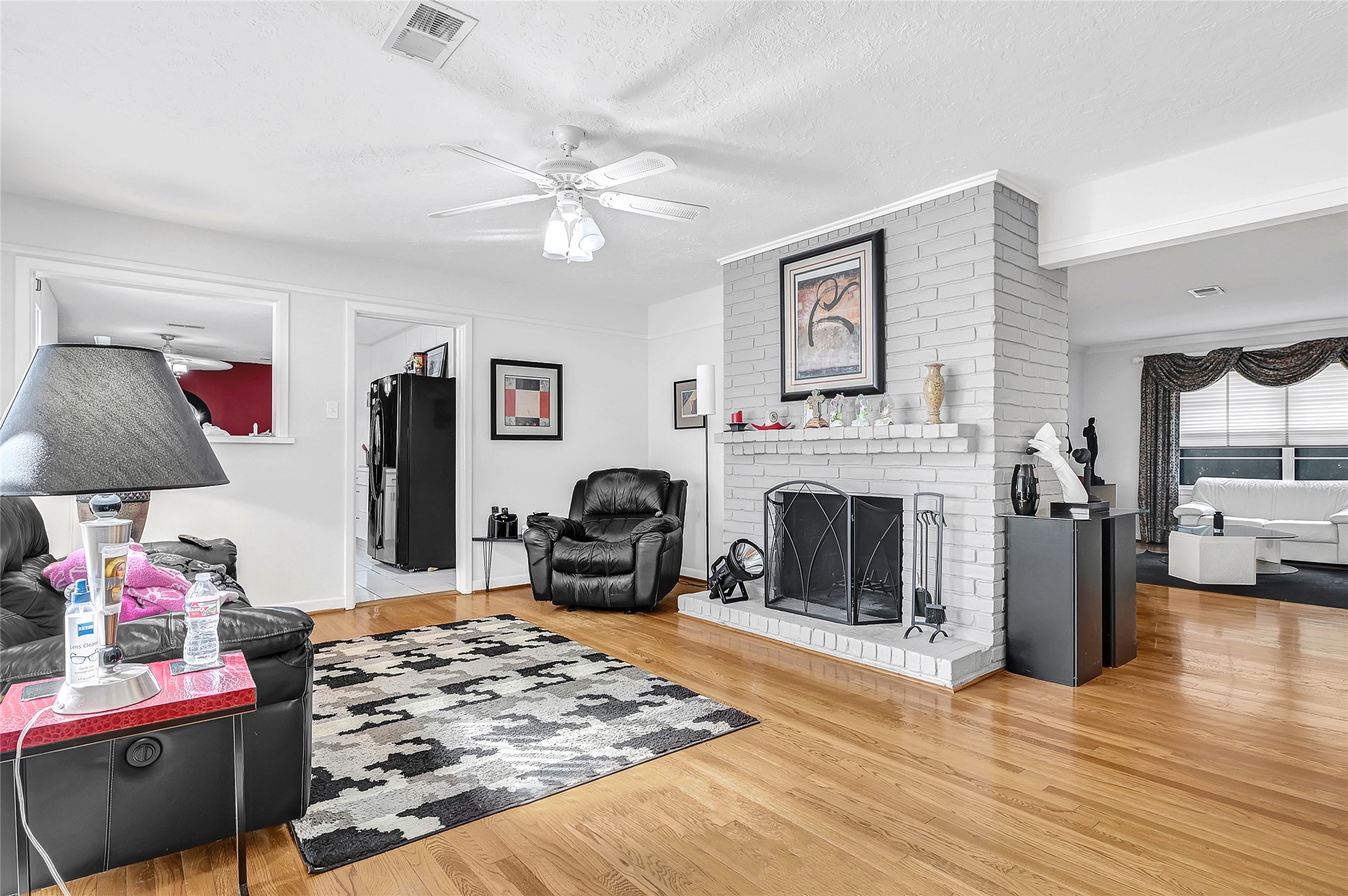4831 Knickerbocker Street Houston, TX 77035 - Photo 17 of 50 a living room with furniture and a fireplace