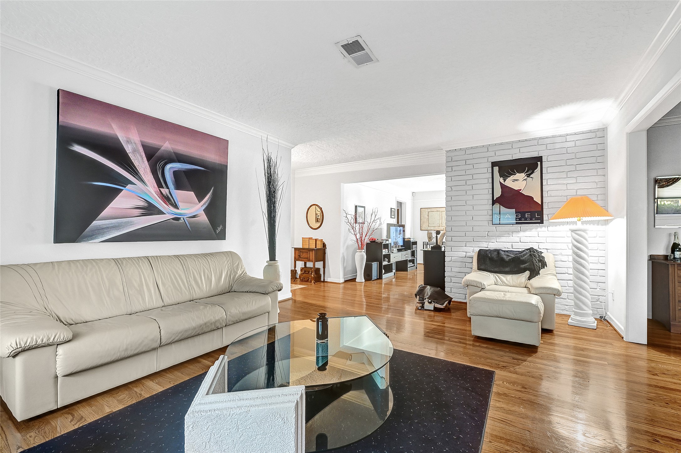 4831 Knickerbocker Street Houston, TX 77035 - Photo 9 of 50 a living room with furniture and a wooden floor