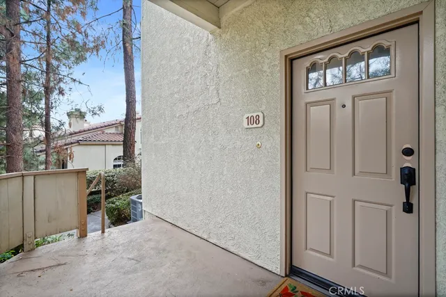 a view of room with walk in closet and window