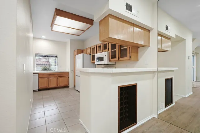 a front view of a house with a garage