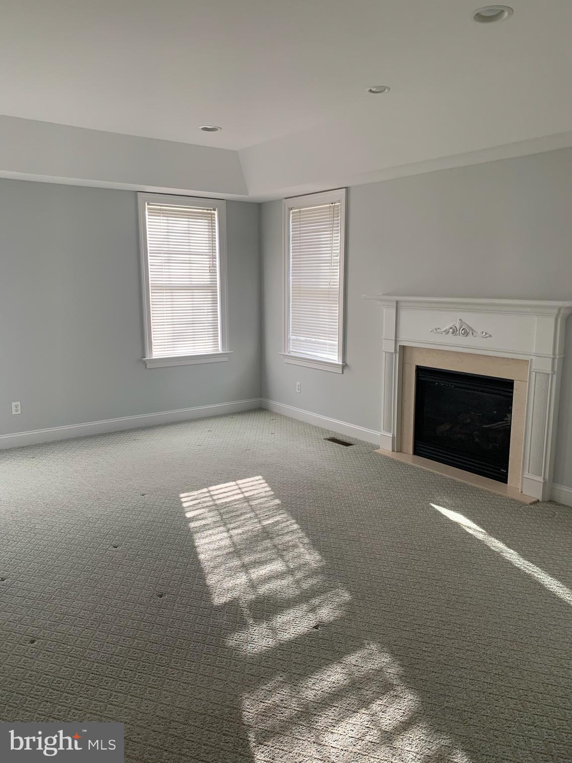 2 Wicklow Court Wayne, PA 19087 - Photo 7 of 9 Master bedroom with fireplace