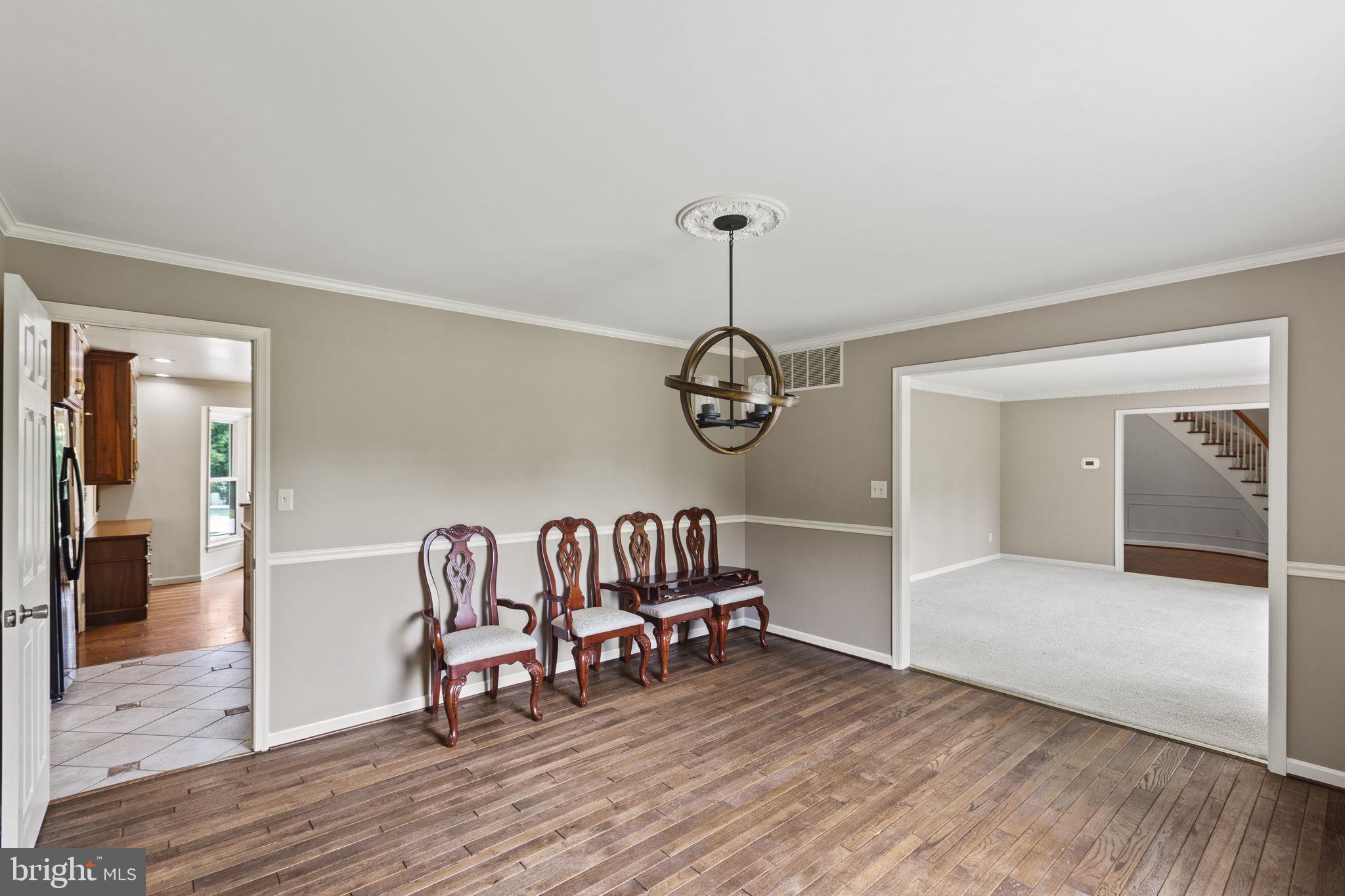 29956 Point Lookout Road Mechanicsville, MD 20659 - Photo 13 of 70 a view of a livingroom with furniture wooden floor and windows