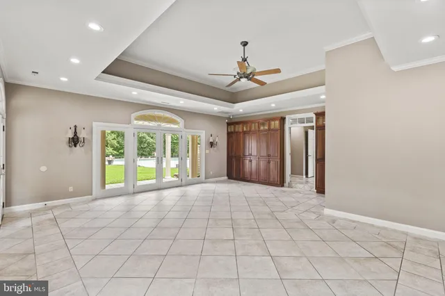 an aerial view of a house with outdoor space and street view