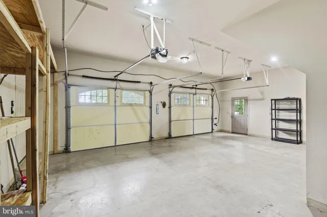 a view of a swimming pool with lounge chair