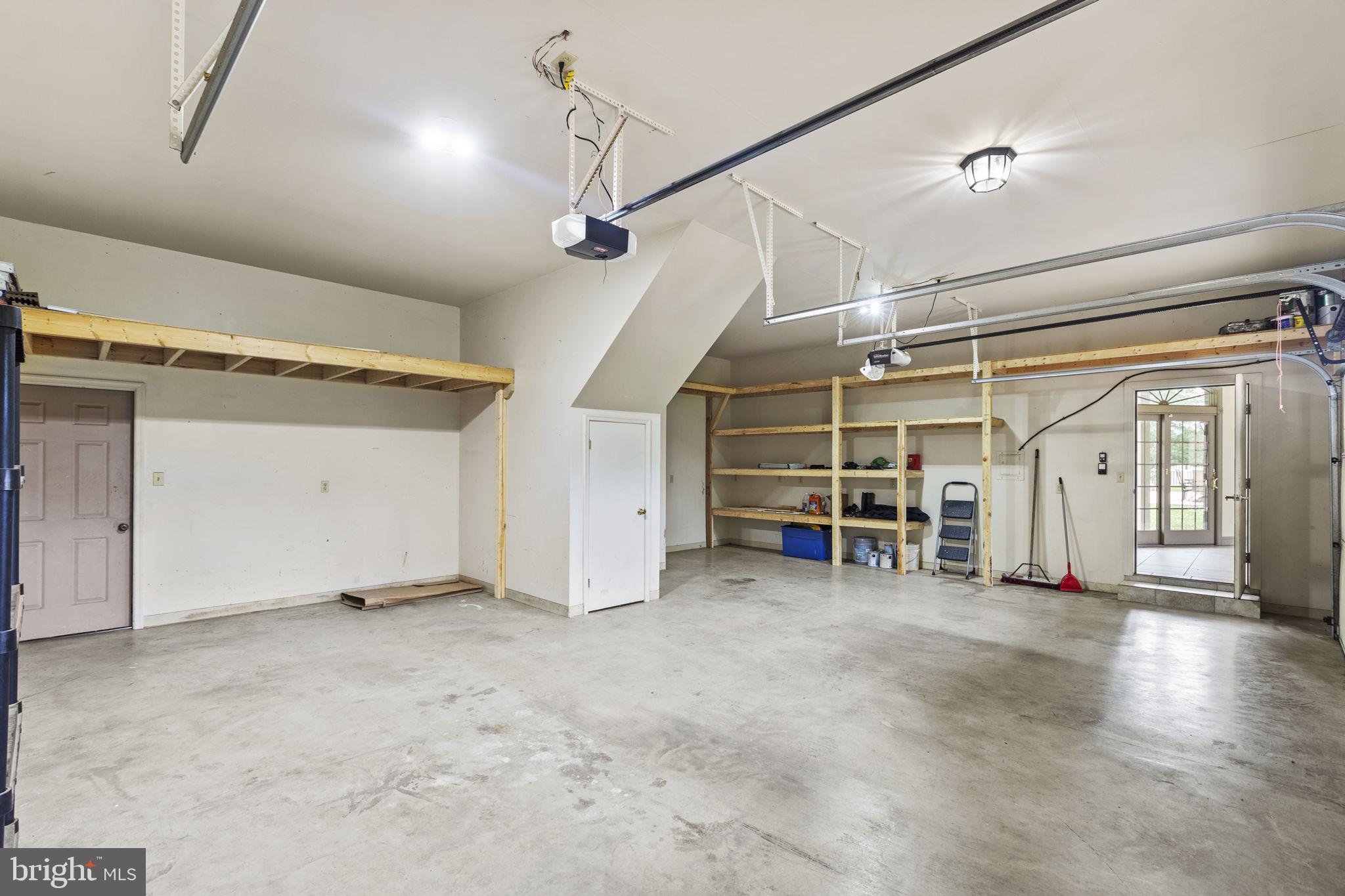 29956 Point Lookout Road Mechanicsville, MD 20659 - Photo 42 of 70 a view of empty room with wooden floor and windows