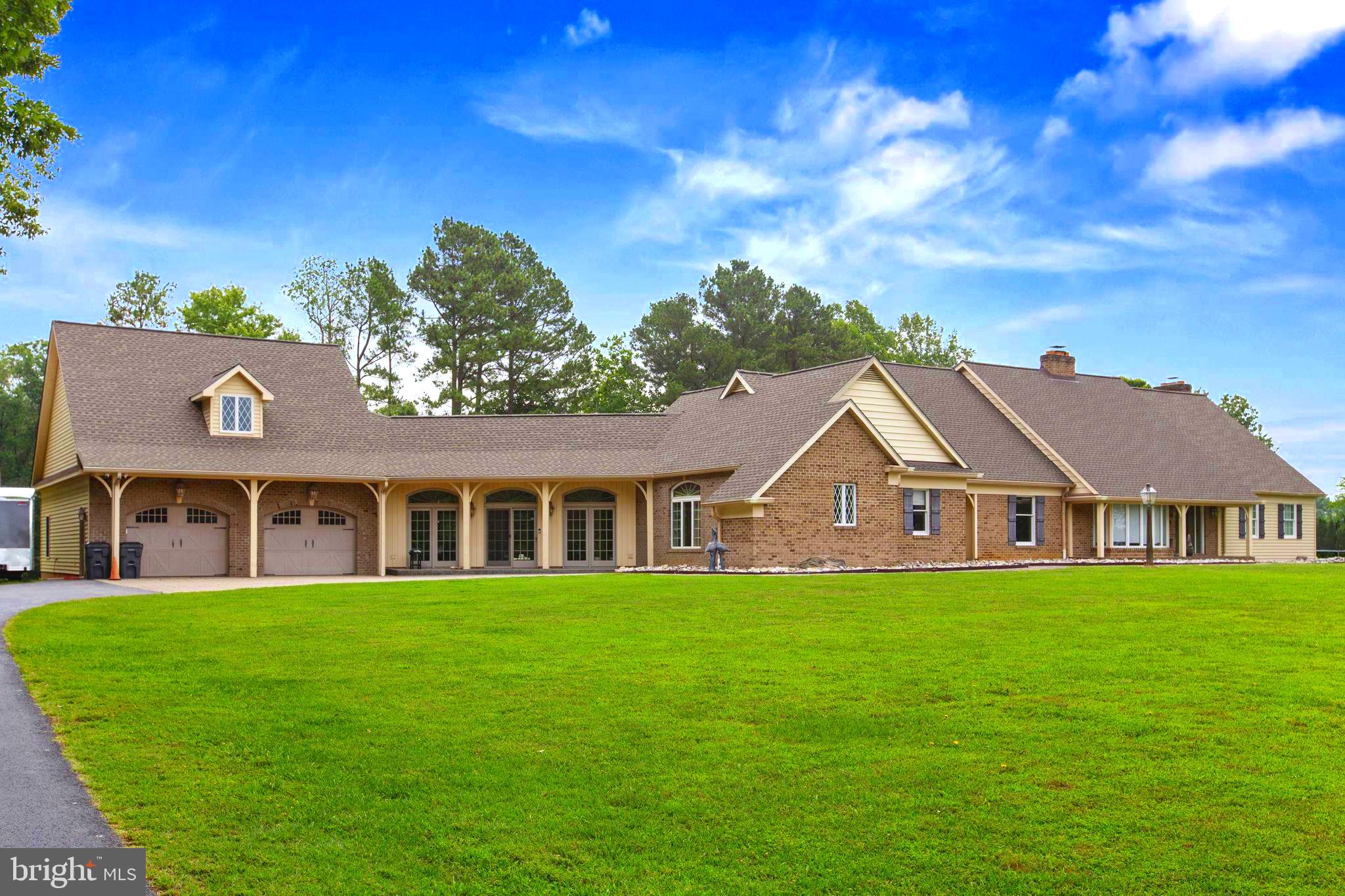 29956 Point Lookout Road Mechanicsville, MD 20659 - Photo 48 of 70 a view of a house with a big yard and large trees