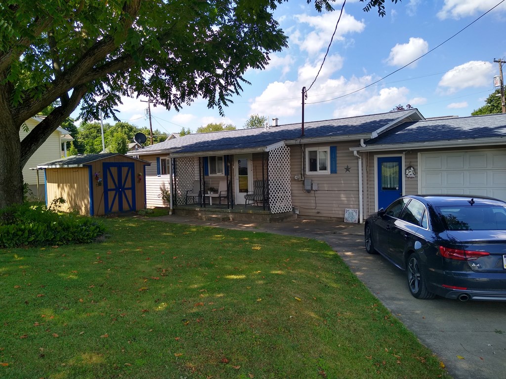 492 Chestnut Street Rimersburg, PA 16248 - Photo 12 of 15 a front view of a house with garden