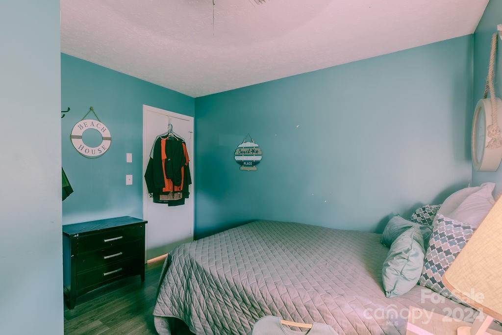 162 Pine Ridge Trail Pinnacle, NC 27043 - Photo 18 of 41 a bedroom with a bed and a closet