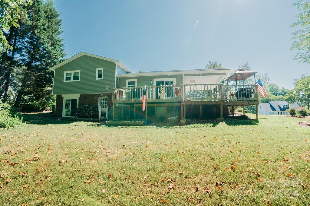 162 Pine Ridge Trail Pinnacle, NC 27043 - Photo 33 of 41 a front view of a house with a yard and garage