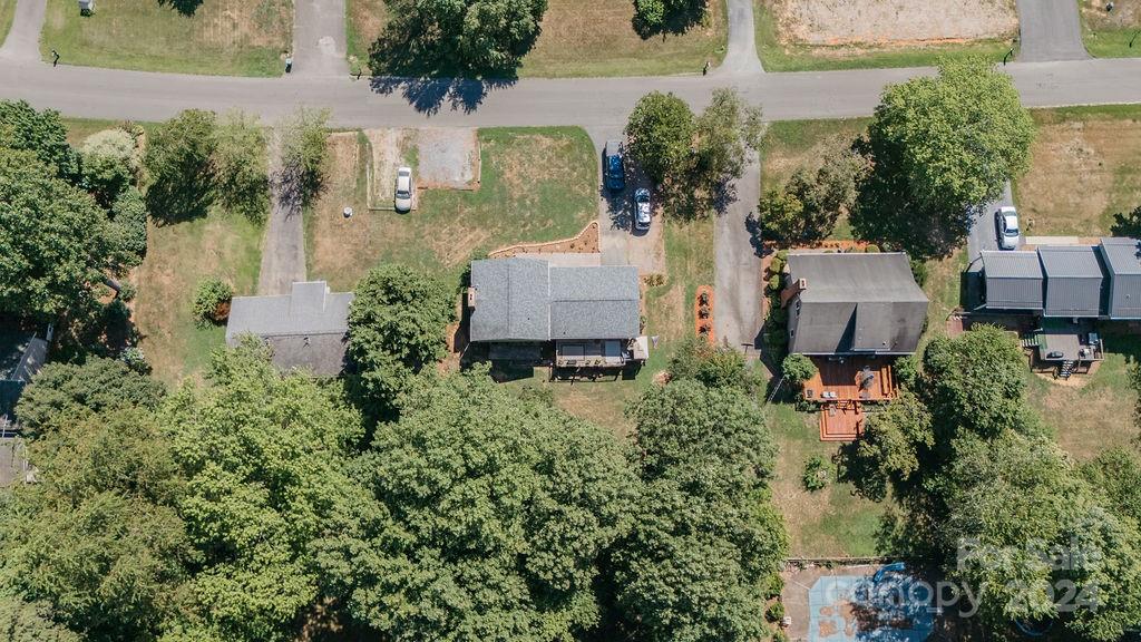 162 Pine Ridge Trail Pinnacle, NC 27043 - Photo 5 of 41 an aerial view of a house with a yard and large trees