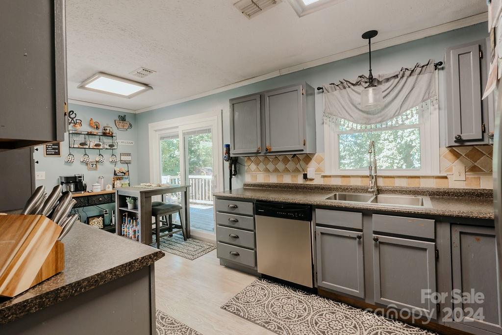 162 Pine Ridge Trail Pinnacle, NC 27043 - Photo 8 of 41 a kitchen with a table and chairs in it