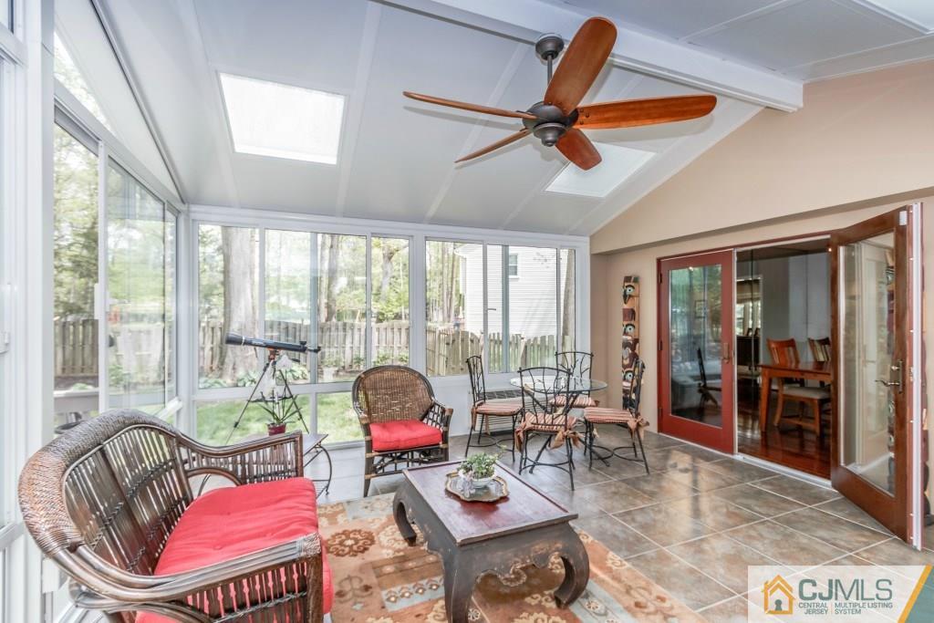 26 Fox Hill Road Edison, NJ 08820 - Photo 13 of 23 a living room with furniture and floor to ceiling windows
