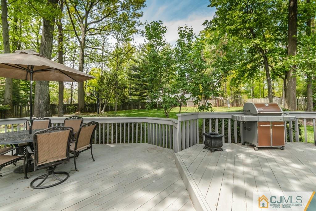 26 Fox Hill Road Edison, NJ 08820 - Photo 19 of 23 a view of a chair and table in the patio