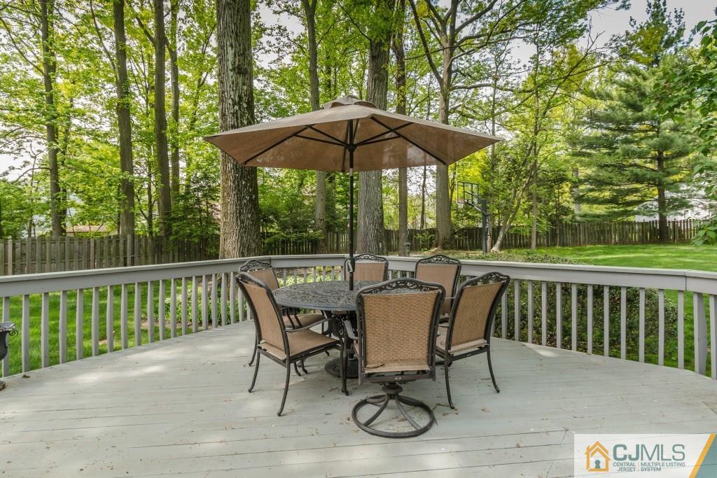 26 Fox Hill Road Edison, NJ 08820 - Photo 20 of 23 a view of balcony with wooden floor and outdoor seating