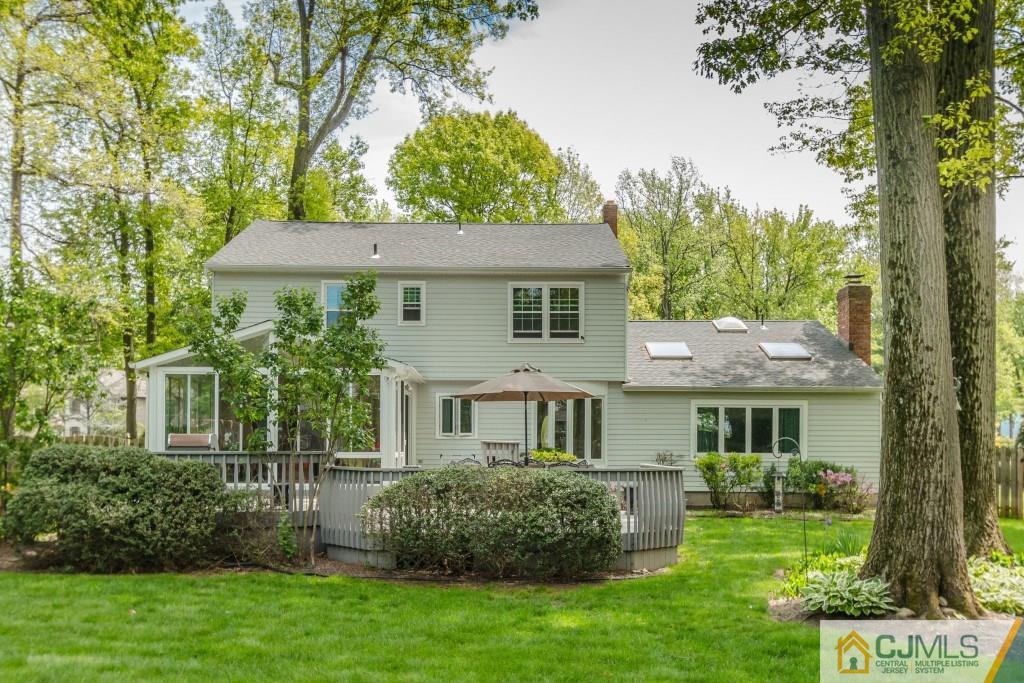 26 Fox Hill Road Edison, NJ 08820 - Photo 23 of 23 a front view of a house with a garden