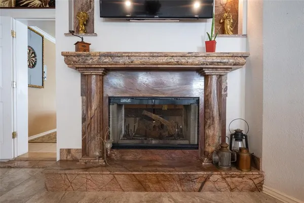 a fireplace with a clock on top of it