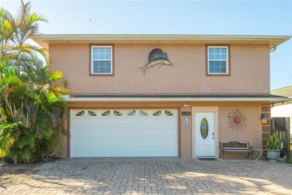 a view of kitchen with furniture and staircase