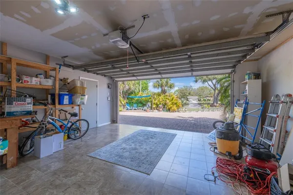 an aerial view of a house with outdoor space