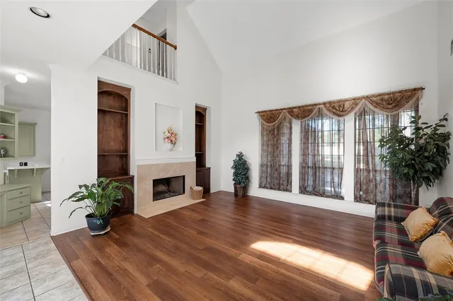 a view of a livingroom with furniture and a fireplace