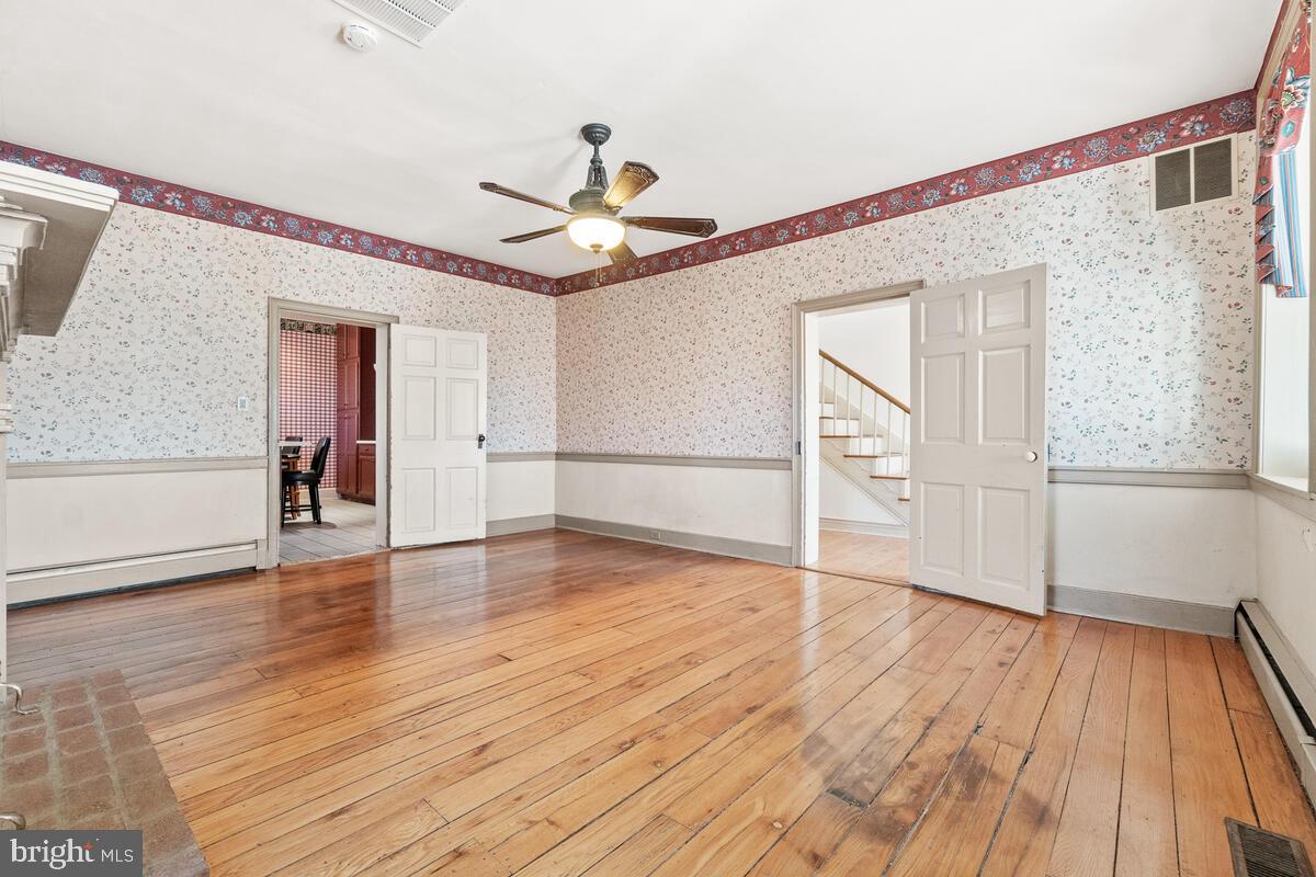 14409 Old Frederick Road Rocky Ridge, MD 21778 - Photo 34 of 82 Dining room w/original HW floors