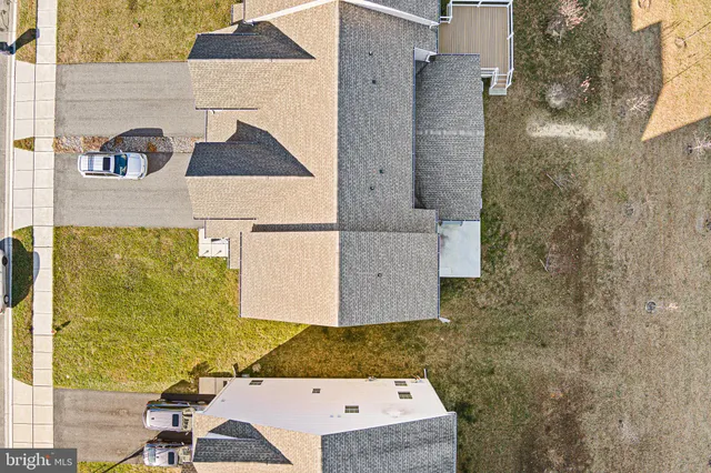 an aerial view of residential house with outdoor space