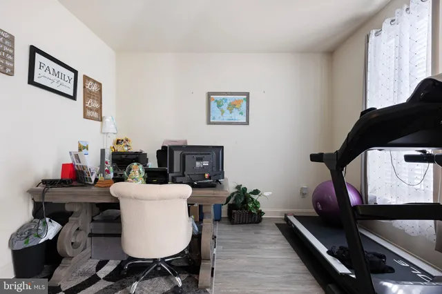 a view of a workspace with furniture and toys