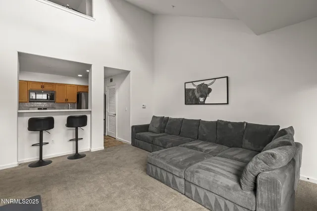 a living room with furniture and a couch