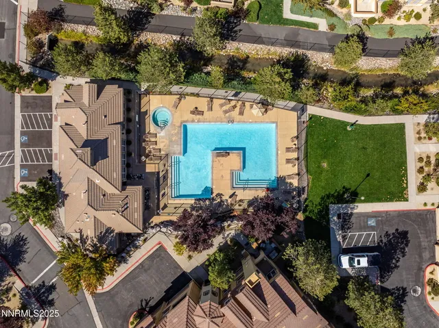an aerial view of residential house with outdoor space