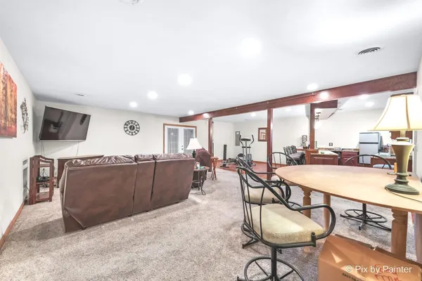 a kitchen with a sink a counter top space and appliances