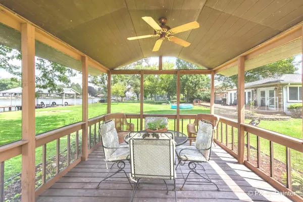 wooden floor with a window in a living room