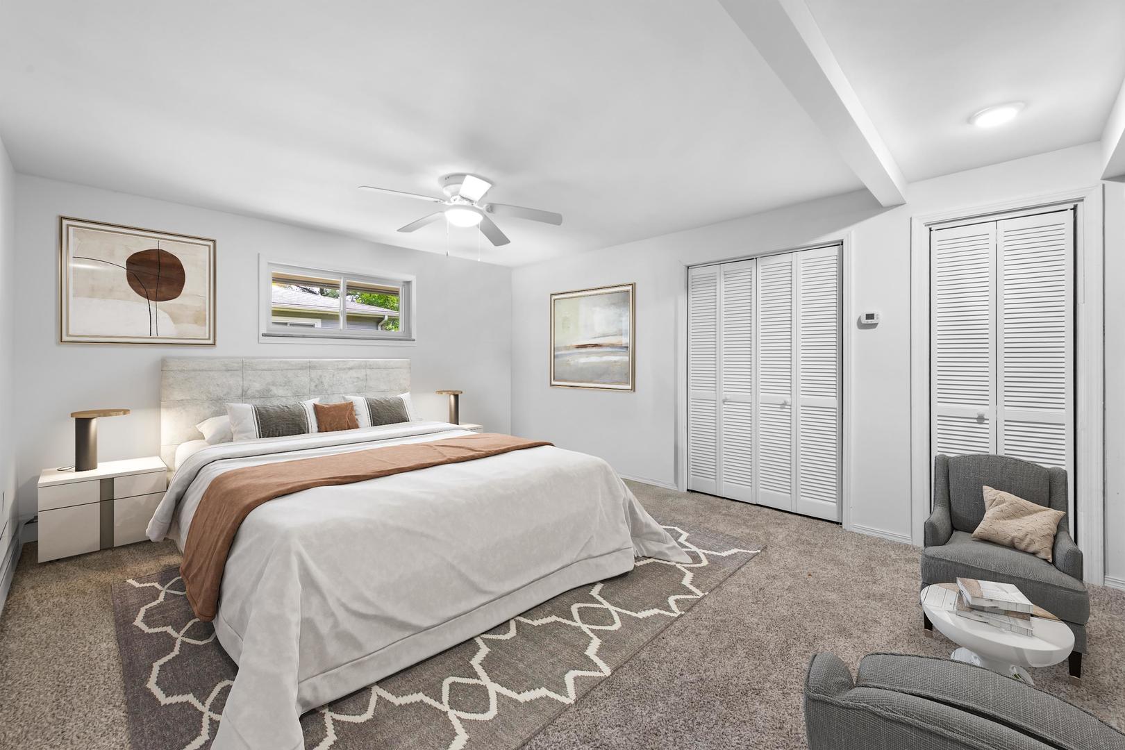 1423 North River Road McHenry, IL 60051 - Photo 9 of 49 a bedroom with a bed and a window