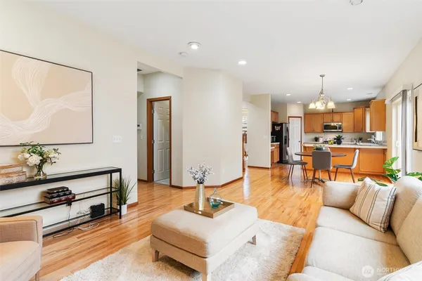 a living room with furniture and a table