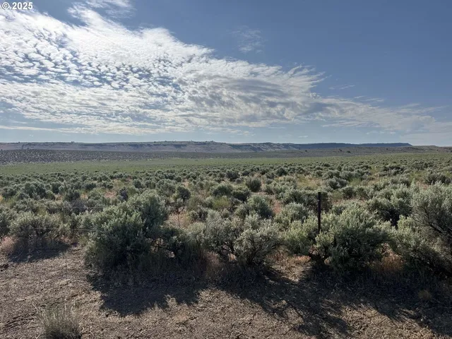 a view of an ocean and mountain