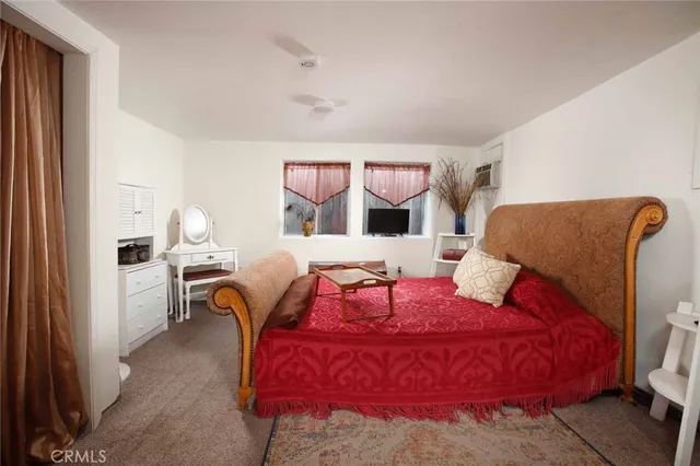 a view of a chairs and table in backyard