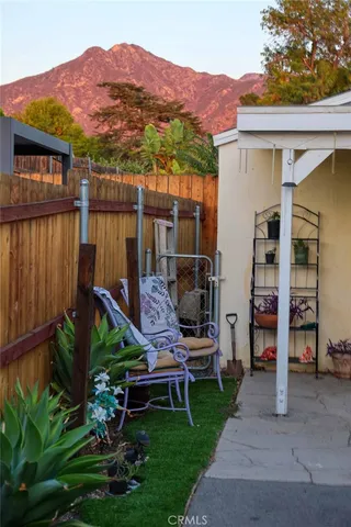 a view of a backyard of the house
